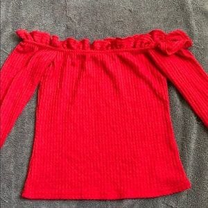 Red of the shoulder crop top.